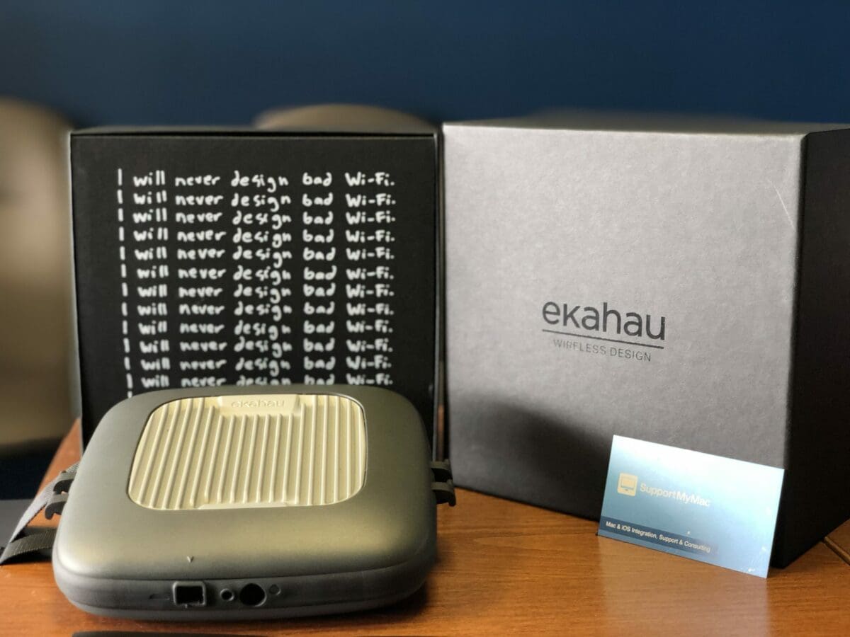 An Ekahau packaging with SupportMyMac business card, with booklet that says I will never design bad Wi-Fi