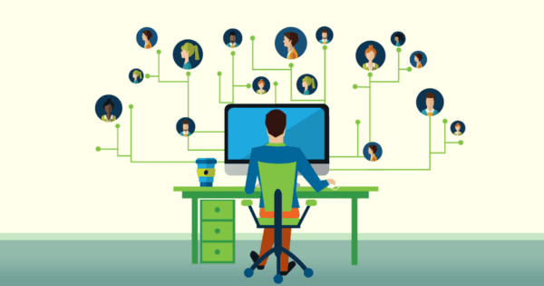 A graphic image of an employee working from home at a desk, connected to coworkers through technology